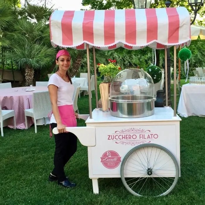 Server at the cotton candy cart