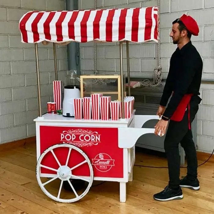 Popcorn cart with server at a wedding